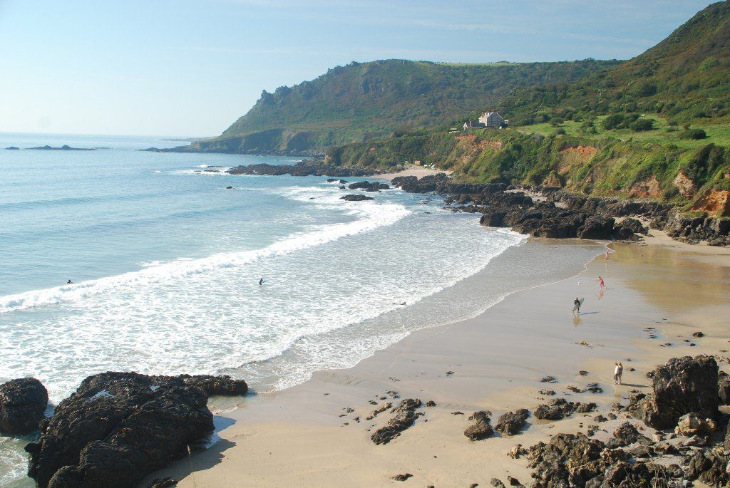 England's Coast Path, a lonely beach lapped by the waves