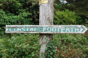 Coast Path Cornwall weather-beaten signpost